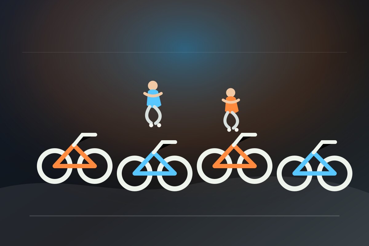 Zajęcia indoor cycling z rowerami treningowymi i dynamicznym oświetleniem.